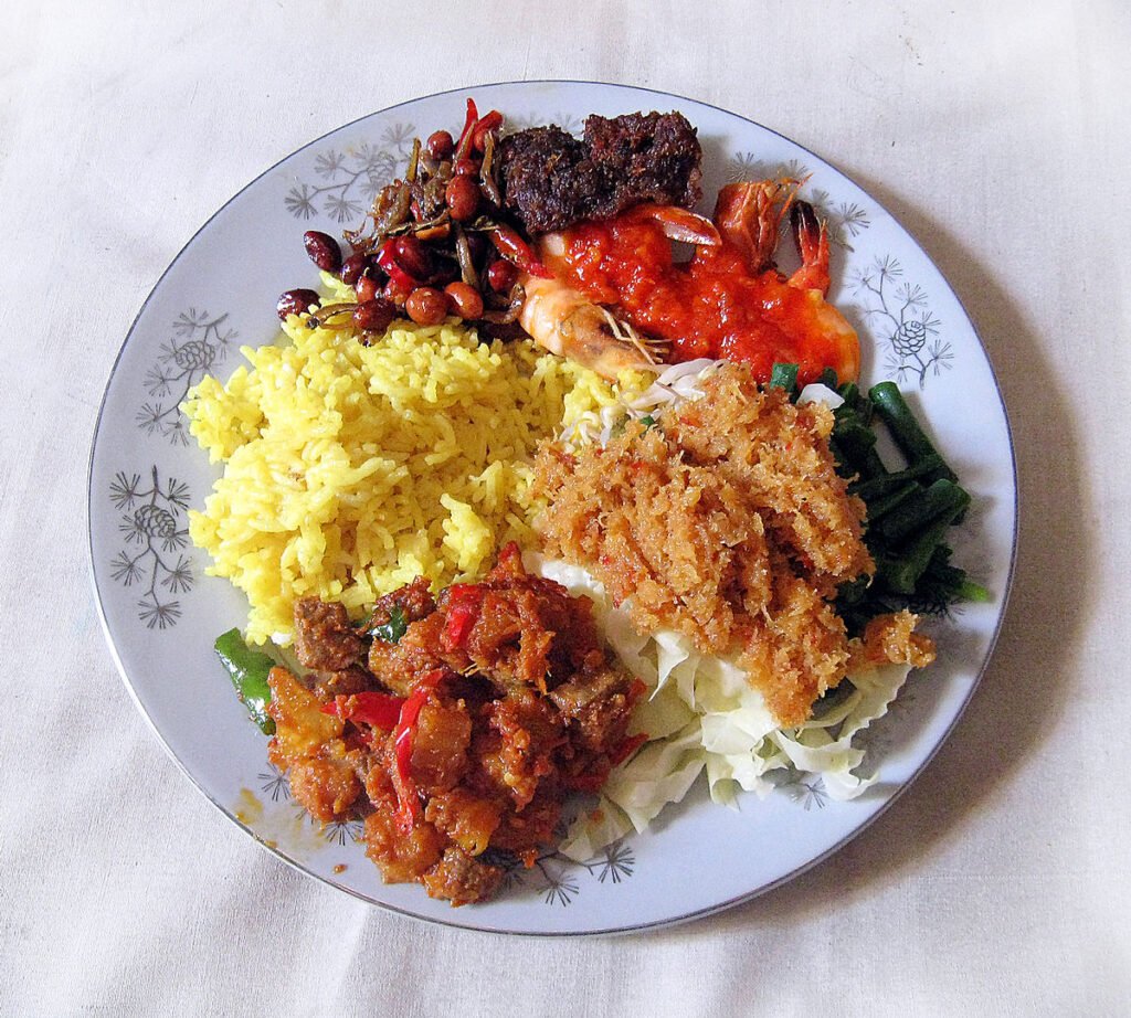 nasi kuning
bumbu nasi kuning
cara bikin nasi kuning di magic com
cara membuat nasi kuning yang enak
nasi kuning rice cooker
cara membuat nasi kuning